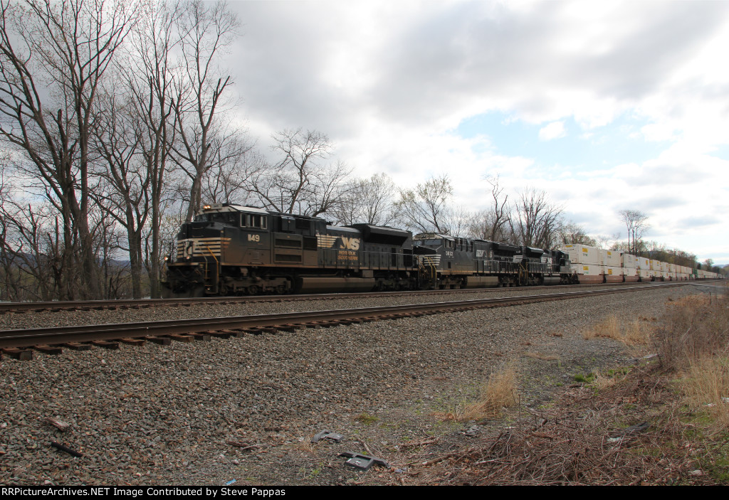 NS train 25G heads east through Cove PA with 1149 leading.